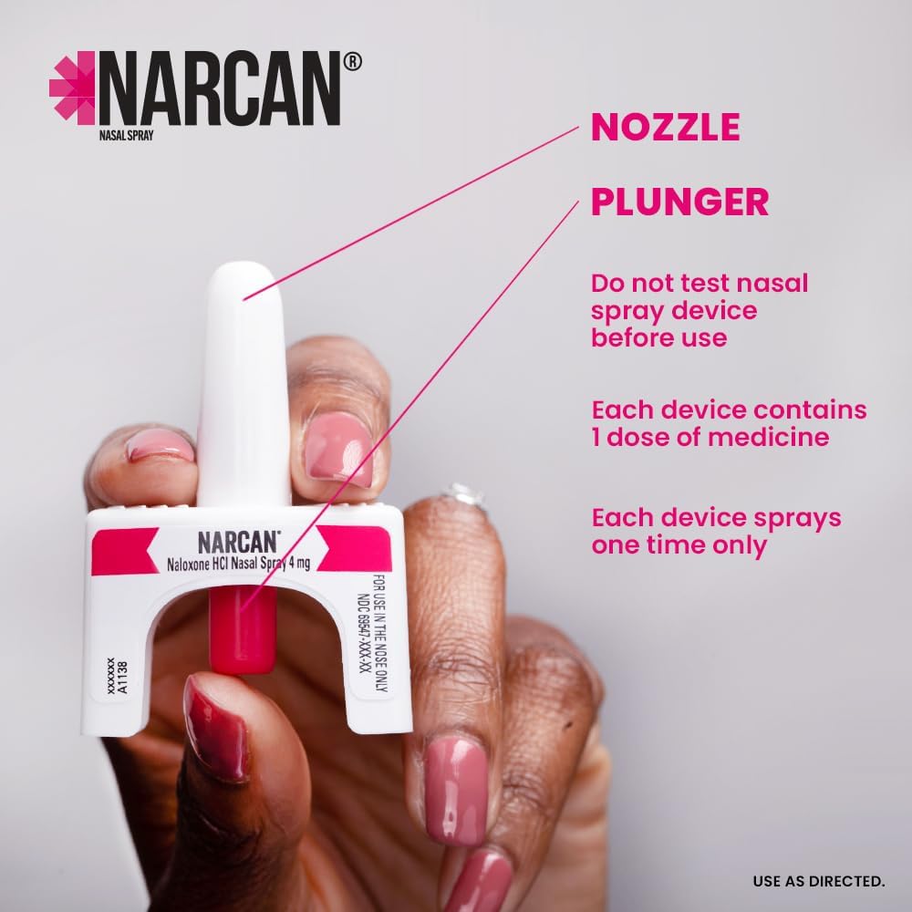 Close-up of Narcan nasal spray showing labeled nozzle and plunger with usage instructions.