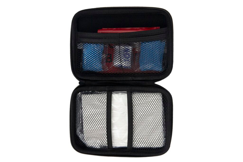 Open Overdose Responder Kit with mesh pockets ready to hold supplies, showing interior organization and compartments.