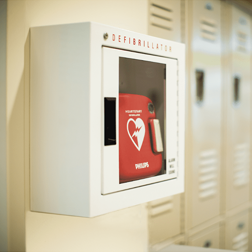 philips aed inside cabinet in a school